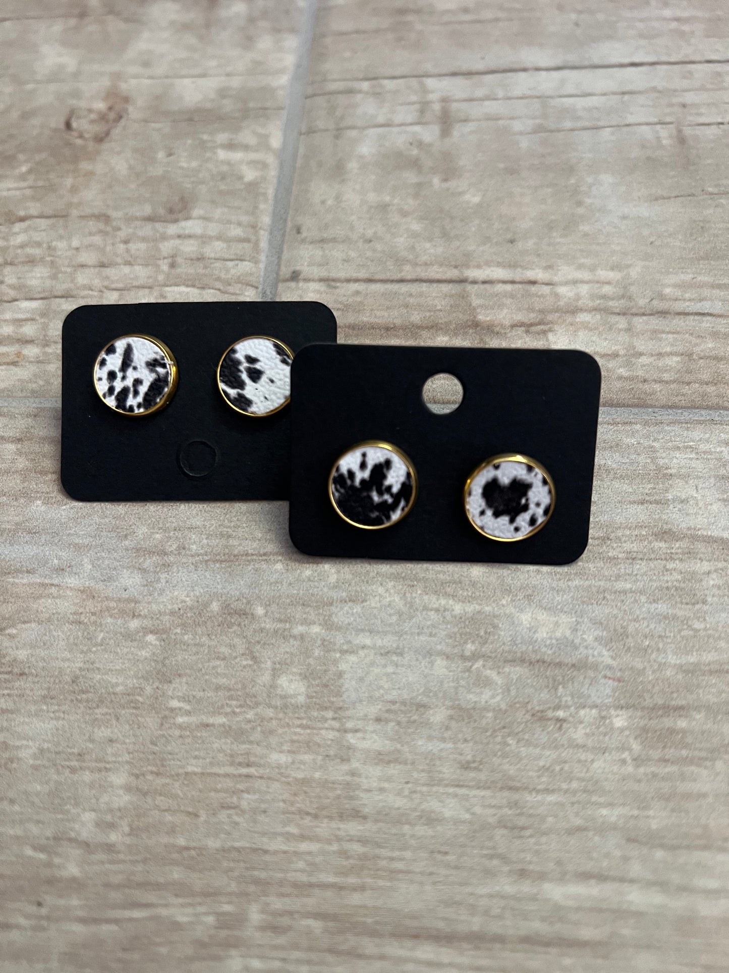 Cow print metal studs